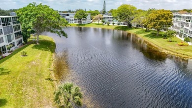 Great Location, fully remodeled and furnished with a modern on Hillsboro Pines Golf in Florida - for sale on GolfHomes.com, golf home, golf lot