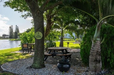 Great Location, fully remodeled and furnished with a modern on Hillsboro Pines Golf in Florida - for sale on GolfHomes.com, golf home, golf lot
