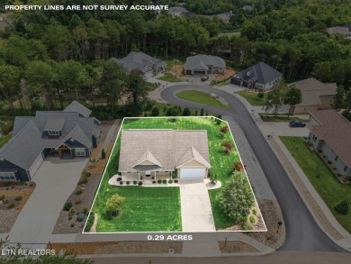 Experience the best of Tellico Village living at 104 Gado Way--a on Tellico Village Golf Club in Tennessee - for sale on GolfHomes.com, golf home, golf lot