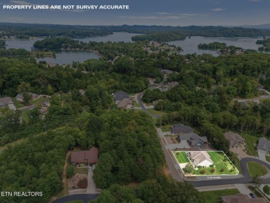 Experience the best of Tellico Village living at 104 Gado Way--a on Tellico Village Golf Club in Tennessee - for sale on GolfHomes.com, golf home, golf lot