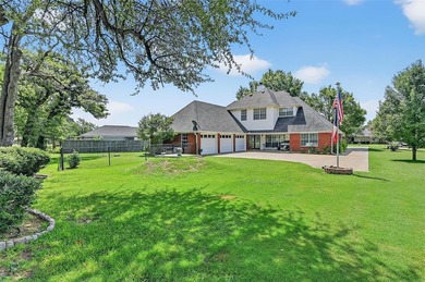 Location, location, location! This custom two-story brick home on Lake Kiowa Golf Course in Texas - for sale on GolfHomes.com, golf home, golf lot