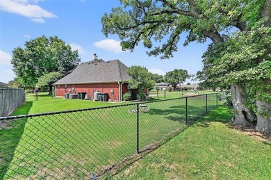 Location, location, location! This custom two-story brick home on Lake Kiowa Golf Course in Texas - for sale on GolfHomes.com, golf home, golf lot
