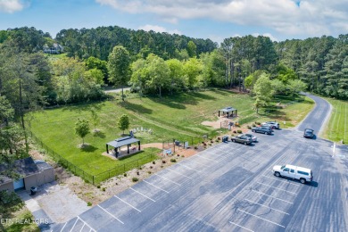 Experience the best of Tellico Village living at 104 Gado Way--a on Tellico Village Golf Club in Tennessee - for sale on GolfHomes.com, golf home, golf lot