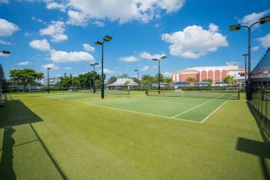 Great Location, fully remodeled and furnished with a modern on Hillsboro Pines Golf in Florida - for sale on GolfHomes.com, golf home, golf lot