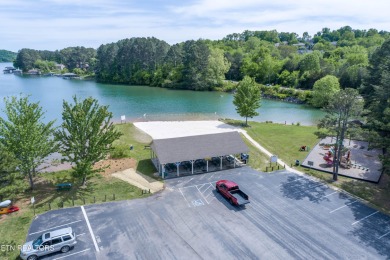 Experience the best of Tellico Village living at 104 Gado Way--a on Tellico Village Golf Club in Tennessee - for sale on GolfHomes.com, golf home, golf lot