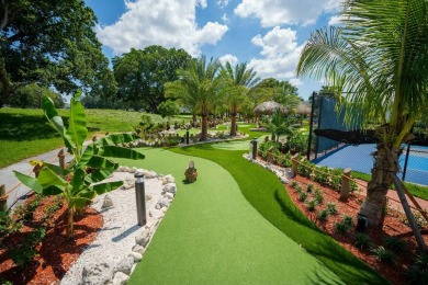Great Location, fully remodeled and furnished with a modern on Hillsboro Pines Golf in Florida - for sale on GolfHomes.com, golf home, golf lot