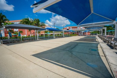 Great Location, fully remodeled and furnished with a modern on Hillsboro Pines Golf in Florida - for sale on GolfHomes.com, golf home, golf lot