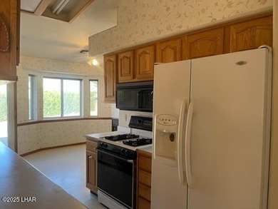 Located in the Residential Estates Area. Surrounded by upscale on London Bridge Golf Course in Arizona - for sale on GolfHomes.com, golf home, golf lot