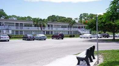 Beautiful 1 bed, 1 bath condo with an open floor plan located on on Hillsboro Pines Golf in Florida - for sale on GolfHomes.com, golf home, golf lot