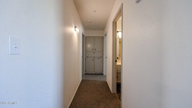 This Sun City home is freshly painted inside and out with on Sun City Lakes West and East in Arizona - for sale on GolfHomes.com, golf home, golf lot