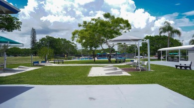 Beautiful 1 bed, 1 bath condo with an open floor plan located on on Hillsboro Pines Golf in Florida - for sale on GolfHomes.com, golf home, golf lot