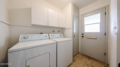 This Sun City home is freshly painted inside and out with on Sun City Lakes West and East in Arizona - for sale on GolfHomes.com, golf home, golf lot