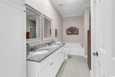 This beautiful condo has it all!  Two primary suites both with on Pawleys Plantation Golf and Country Club in South Carolina - for sale on GolfHomes.com, golf home, golf lot