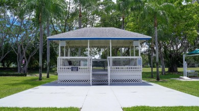 Beautiful 1 bed, 1 bath condo with an open floor plan located on on Hillsboro Pines Golf in Florida - for sale on GolfHomes.com, golf home, golf lot