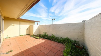 This Sun City home is freshly painted inside and out with on Sun City Lakes West and East in Arizona - for sale on GolfHomes.com, golf home, golf lot