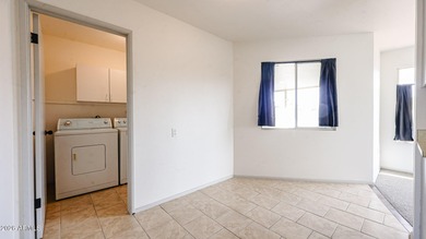 This Sun City home is freshly painted inside and out with on Sun City Lakes West and East in Arizona - for sale on GolfHomes.com, golf home, golf lot