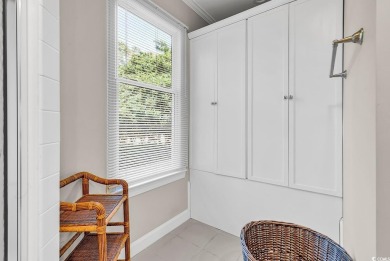 This beautiful condo has it all!  Two primary suites both with on Pawleys Plantation Golf and Country Club in South Carolina - for sale on GolfHomes.com, golf home, golf lot