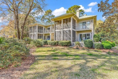 This beautiful condo has it all!  Two primary suites both with on Pawleys Plantation Golf and Country Club in South Carolina - for sale on GolfHomes.com, golf home, golf lot