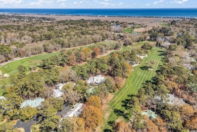 This beautiful condo has it all!  Two primary suites both with on Pawleys Plantation Golf and Country Club in South Carolina - for sale on GolfHomes.com, golf home, golf lot