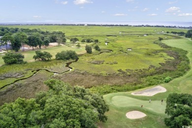 This beautiful condo has it all!  Two primary suites both with on Pawleys Plantation Golf and Country Club in South Carolina - for sale on GolfHomes.com, golf home, golf lot