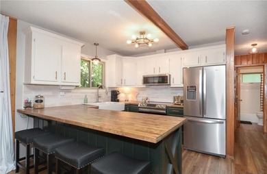 This adorable, updated rambler feels like the perfect Wisconsin on Voyager Village Country Club - Voyager in Wisconsin - for sale on GolfHomes.com, golf home, golf lot