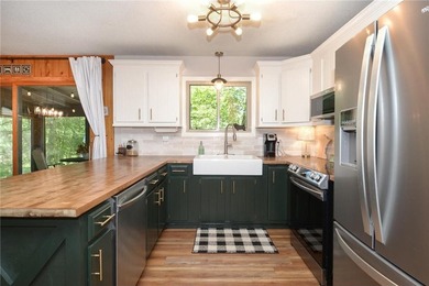 This adorable, updated rambler feels like the perfect Wisconsin on Voyager Village Country Club - Voyager in Wisconsin - for sale on GolfHomes.com, golf home, golf lot