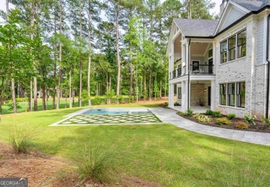 MODERN 2025 CUSTOM GOLF RESIDENCE AT REYNOLDS LAKE OCONEE - on Reynolds Lake Oconee - The Oconee in Georgia - for sale on GolfHomes.com, golf home, golf lot