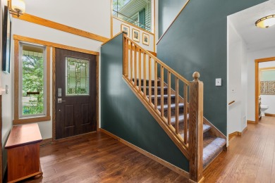 Tucked away on a large, private, wooded lot, this beautifully on Ridgeview Golf Course in Michigan - for sale on GolfHomes.com, golf home, golf lot