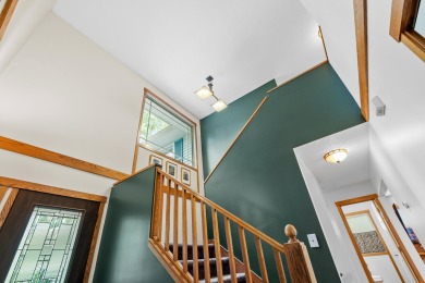 Tucked away on a large, private, wooded lot, this beautifully on Ridgeview Golf Course in Michigan - for sale on GolfHomes.com, golf home, golf lot