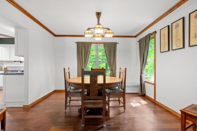 Tucked away on a large, private, wooded lot, this beautifully on Ridgeview Golf Course in Michigan - for sale on GolfHomes.com, golf home, golf lot