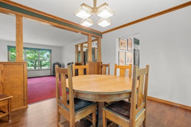 Tucked away on a large, private, wooded lot, this beautifully on Ridgeview Golf Course in Michigan - for sale on GolfHomes.com, golf home, golf lot