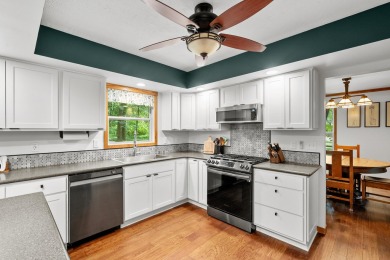 Tucked away on a large, private, wooded lot, this beautifully on Ridgeview Golf Course in Michigan - for sale on GolfHomes.com, golf home, golf lot