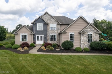 Discover an extraordinary sanctuary nestled within the on Fox Meadow Country Club in Ohio - for sale on GolfHomes.com, golf home, golf lot