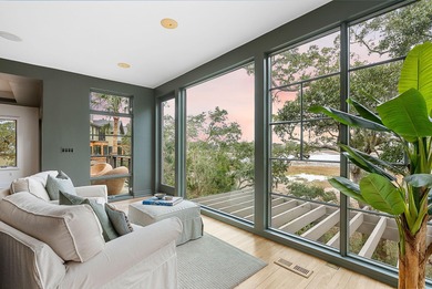 Nestled in Kiawah Island's exclusive Marsh Island neighborhood on Kiawah Island Resort - Cougar Point in South Carolina - for sale on GolfHomes.com, golf home, golf lot