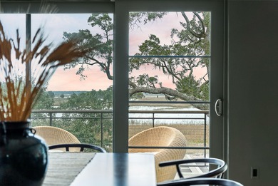 Nestled in Kiawah Island's exclusive Marsh Island neighborhood on Kiawah Island Resort - Cougar Point in South Carolina - for sale on GolfHomes.com, golf home, golf lot