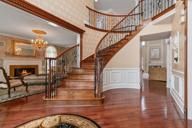 A truly breathtaking all-brick estate offering 4 bedrooms and 3 on Hawthorn Woods Country Club in Illinois - for sale on GolfHomes.com, golf home, golf lot