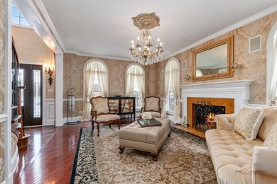 A truly breathtaking all-brick estate offering 4 bedrooms and 3 on Hawthorn Woods Country Club in Illinois - for sale on GolfHomes.com, golf home, golf lot