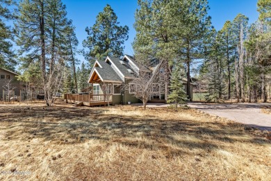 This stunning home is nestled in one of Munds Park's most on Pinewood Country Club in Arizona - for sale on GolfHomes.com, golf home, golf lot