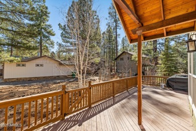 This stunning home is nestled in one of Munds Park's most on Pinewood Country Club in Arizona - for sale on GolfHomes.com, golf home, golf lot