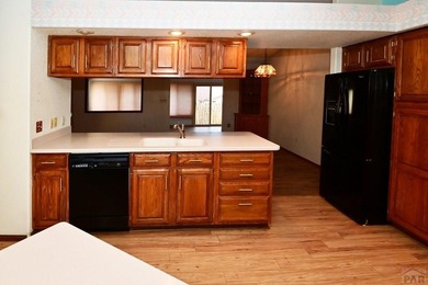 Spacious & Sun-Filled Townhome in Prime Location! Discover the on Desert Hawk At Pueblo West in Colorado - for sale on GolfHomes.com, golf home, golf lot