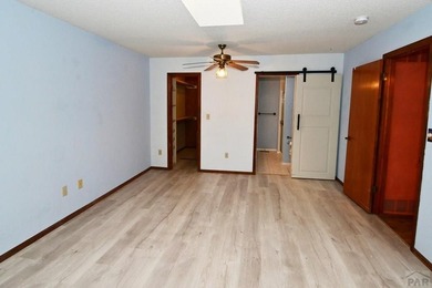 Spacious & Sun-Filled Townhome in Prime Location! Discover the on Desert Hawk At Pueblo West in Colorado - for sale on GolfHomes.com, golf home, golf lot