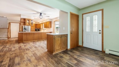 This home has had extreme care and is completely move in ready! on Escanaba Country Club in Michigan - for sale on GolfHomes.com, golf home, golf lot