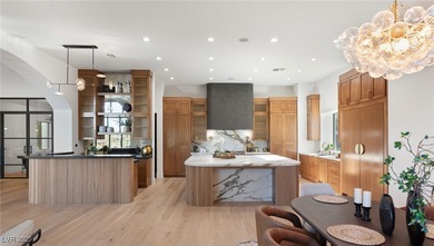 Discover a reimagined luxury masterpiece in guard-gated on TPC Las Vegas in Nevada - for sale on GolfHomes.com, golf home, golf lot