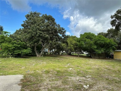 Price Reduced! Fenced-in buildable oversized corner lot in the on Bobby Jones Golf Club in Florida - for sale on GolfHomes.com, golf home, golf lot