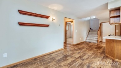 This home has had extreme care and is completely move in ready! on Escanaba Country Club in Michigan - for sale on GolfHomes.com, golf home, golf lot