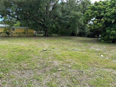 Price Reduced! Fenced-in buildable oversized corner lot in the on Bobby Jones Golf Club in Florida - for sale on GolfHomes.com, golf home, golf lot