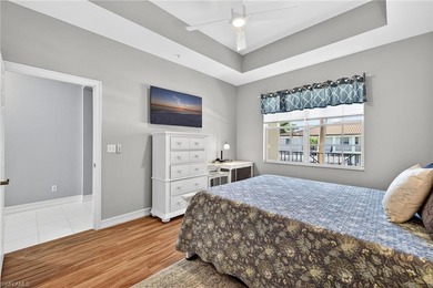 Top-floor 2-bedroom, 2-bath condo located in the heart of the on Pelican Sound Golf and River Club in Florida - for sale on GolfHomes.com, golf home, golf lot