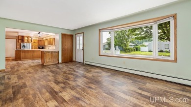 This home has had extreme care and is completely move in ready! on Escanaba Country Club in Michigan - for sale on GolfHomes.com, golf home, golf lot