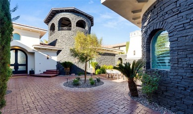 Discover a reimagined luxury masterpiece in guard-gated on TPC Las Vegas in Nevada - for sale on GolfHomes.com, golf home, golf lot
