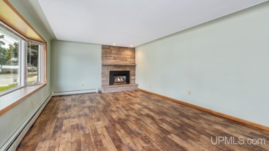This home has had extreme care and is completely move in ready! on Escanaba Country Club in Michigan - for sale on GolfHomes.com, golf home, golf lot